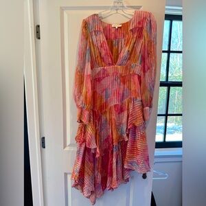 Love Shack Fancy tiered pink, coral, and blue cocktail dress